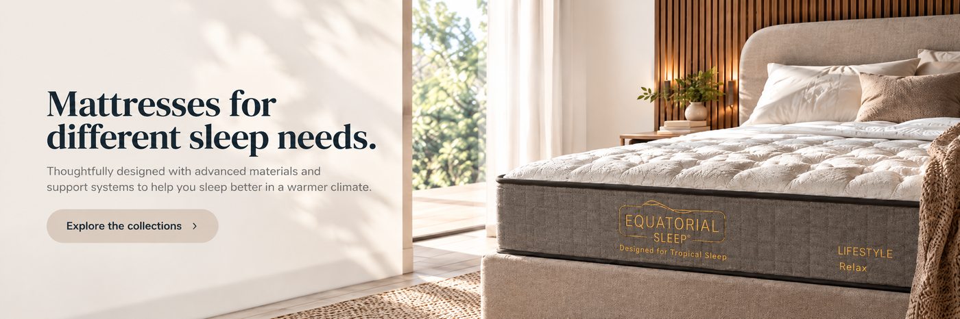 Equatorial Sleep mattress in a warm neutral bedroom with a beige upholstered bed and soft natural daylight.
